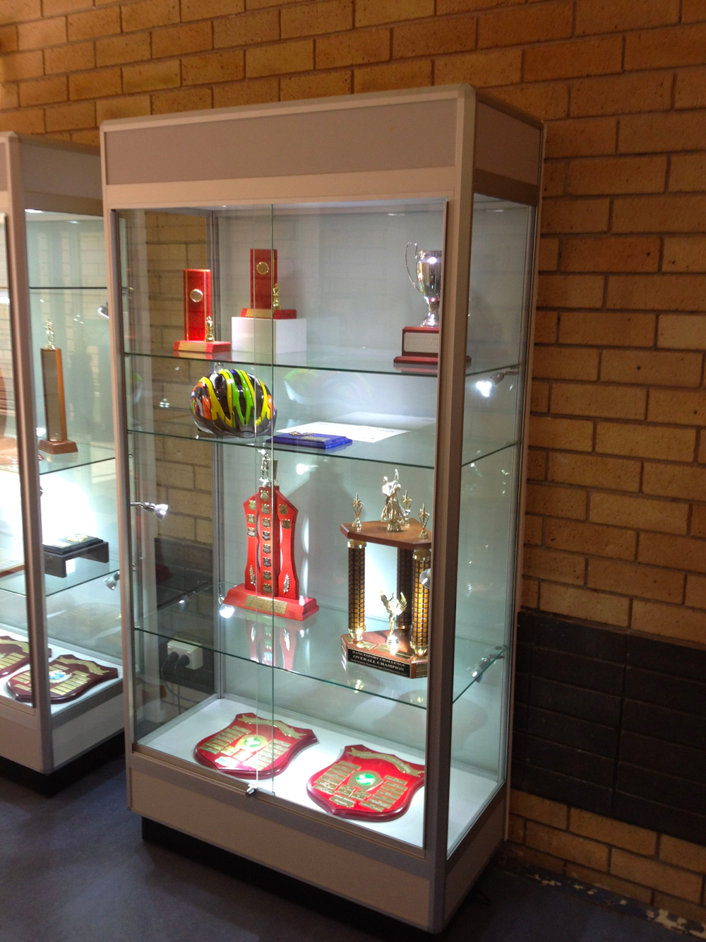 Keep your awards secure and proudly displayed with our TPF trophy award display cases from Showfront.